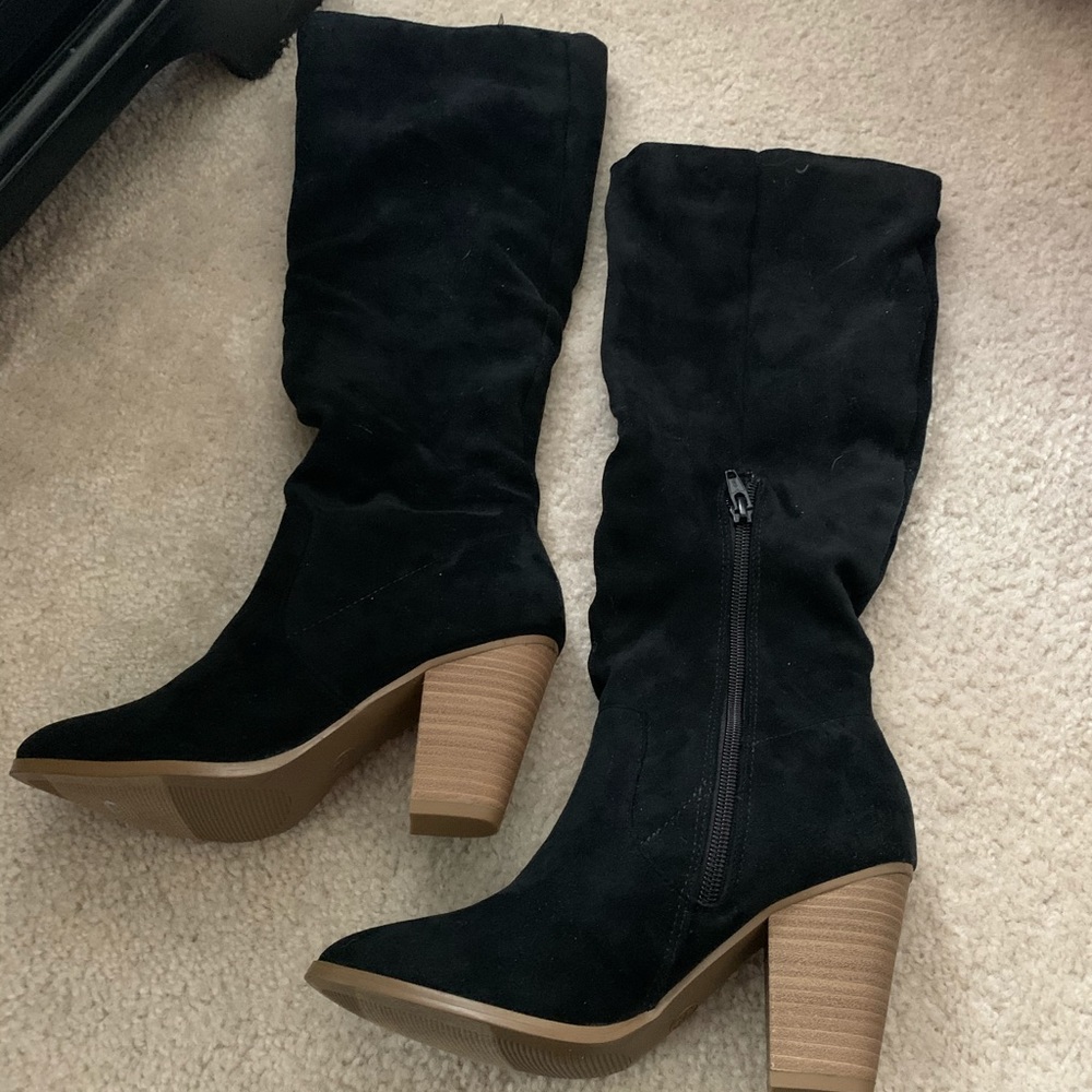 Tall black suede boots